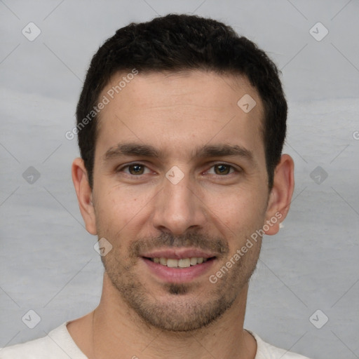 Joyful white young-adult male with short  brown hair and brown eyes