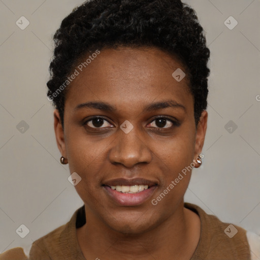 Joyful black young-adult female with short  black hair and brown eyes