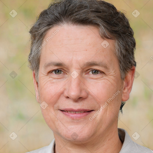 Joyful white middle-aged male with short  brown hair and brown eyes