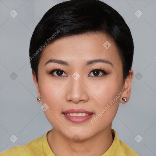 Joyful asian young-adult female with short  brown hair and brown eyes