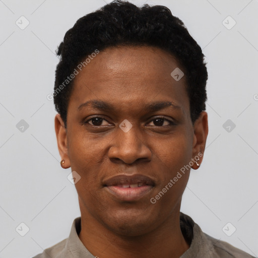Joyful black young-adult female with short  black hair and brown eyes