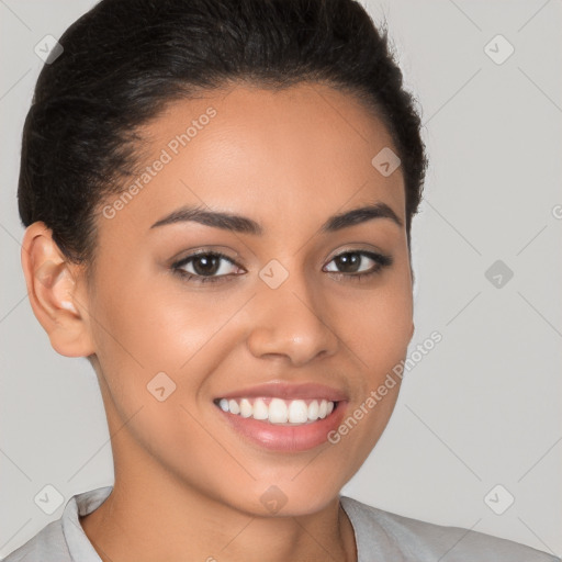 Joyful latino young-adult female with short  brown hair and brown eyes