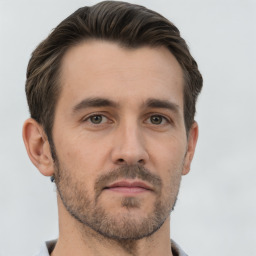 Neutral white young-adult male with short  brown hair and brown eyes