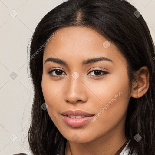 Joyful latino young-adult female with long  brown hair and brown eyes