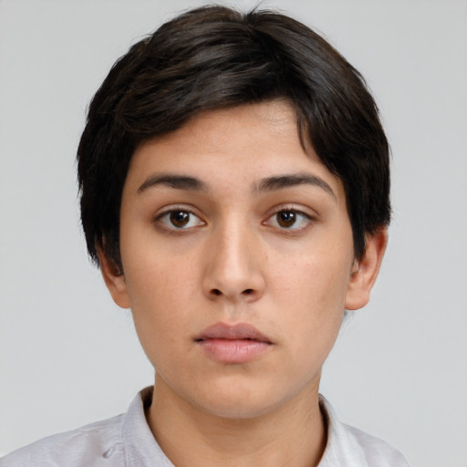 Neutral white young-adult female with short  black hair and brown eyes