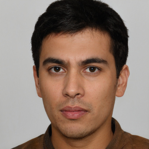 Neutral white young-adult male with short  black hair and brown eyes