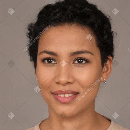 Joyful latino young-adult female with short  brown hair and brown eyes