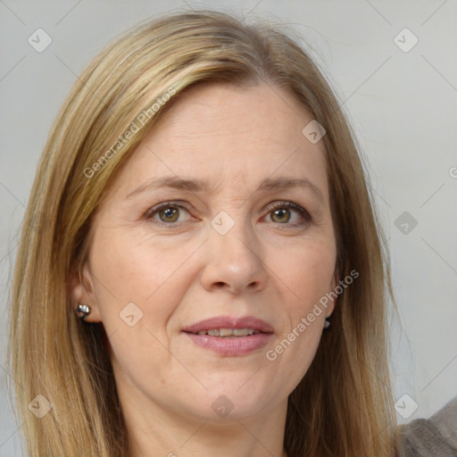 Joyful white adult female with long  brown hair and grey eyes