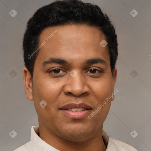 Joyful latino young-adult male with short  black hair and brown eyes