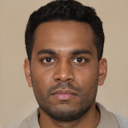 Neutral latino young-adult male with short  brown hair and brown eyes