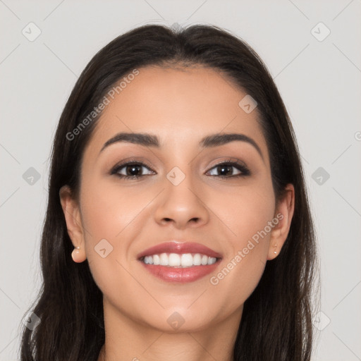 Joyful white young-adult female with long  brown hair and brown eyes