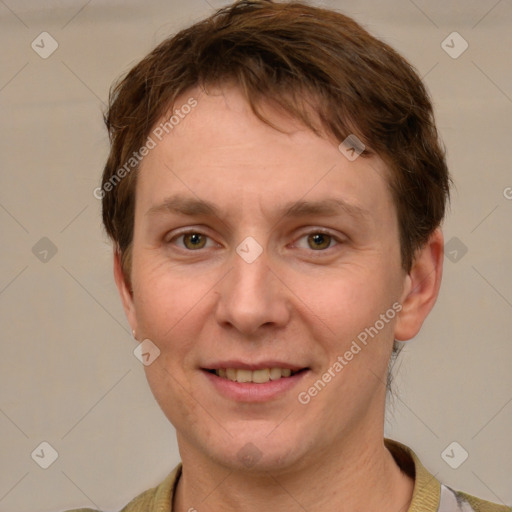 Joyful white adult male with short  brown hair and grey eyes