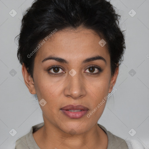 Joyful latino young-adult female with short  brown hair and brown eyes