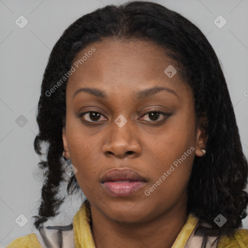 Neutral black young-adult female with medium  brown hair and brown eyes