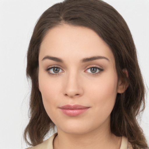 Neutral white young-adult female with medium  brown hair and brown eyes