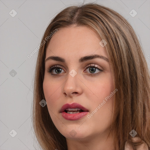 Neutral white young-adult female with long  brown hair and brown eyes