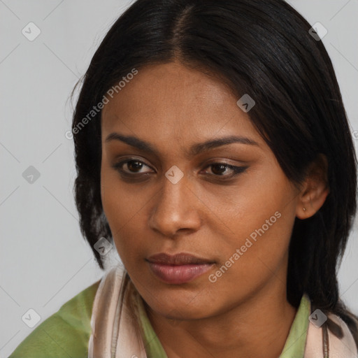 Neutral black young-adult female with medium  brown hair and brown eyes