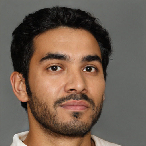 Neutral latino young-adult male with short  black hair and brown eyes