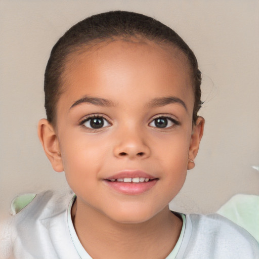 Joyful white child female with short  brown hair and brown eyes