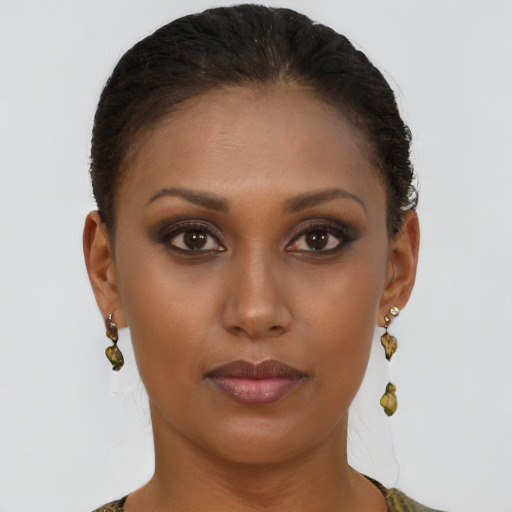Neutral black young-adult female with short  brown hair and brown eyes