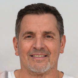 Joyful white middle-aged male with short  brown hair and brown eyes