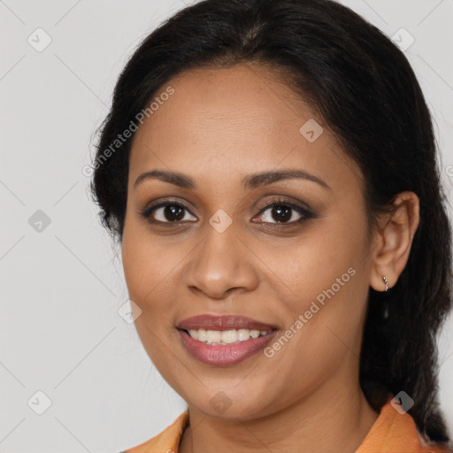 Joyful latino young-adult female with long  brown hair and brown eyes