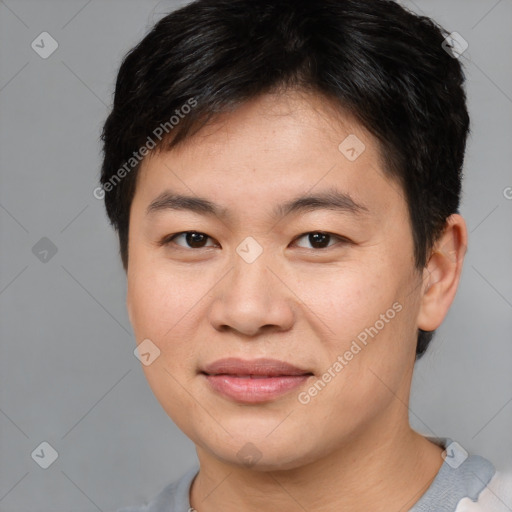 Joyful asian young-adult female with short  brown hair and brown eyes