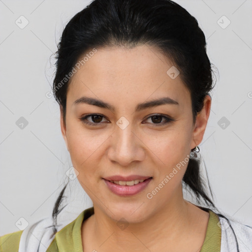 Joyful latino young-adult female with medium  brown hair and brown eyes