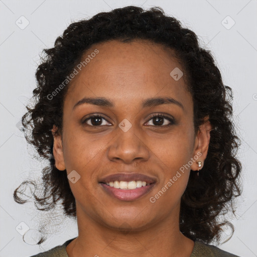 Joyful black young-adult female with medium  brown hair and brown eyes