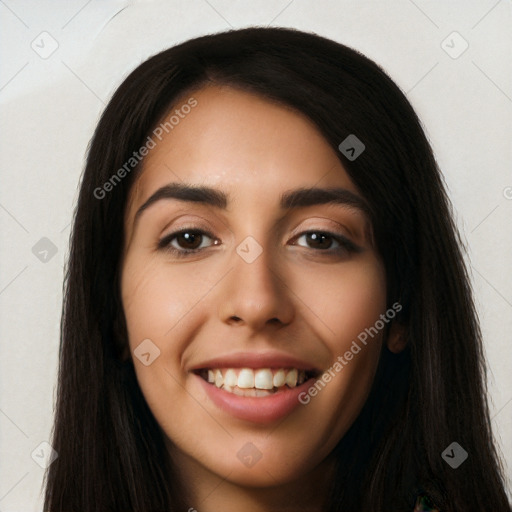 Joyful latino young-adult female with long  black hair and brown eyes