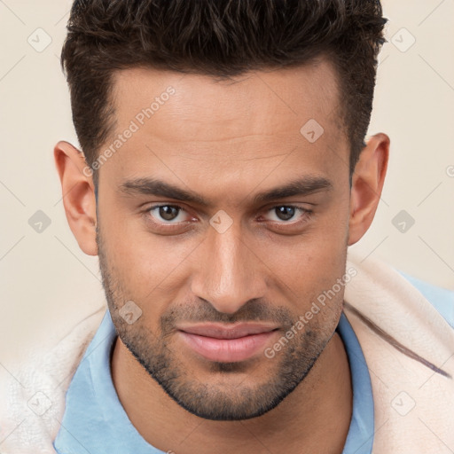 Joyful white young-adult male with short  brown hair and brown eyes