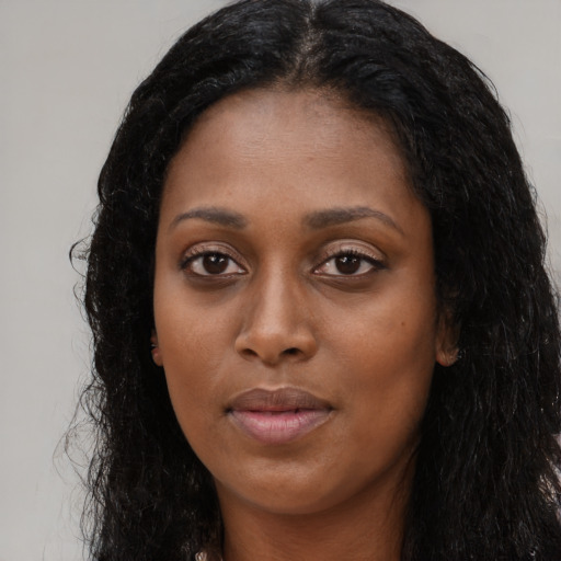 Neutral black young-adult female with long  black hair and brown eyes
