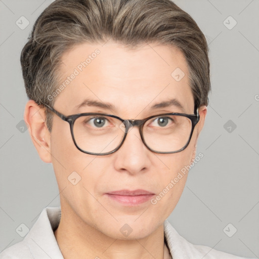 Joyful white adult male with short  brown hair and grey eyes