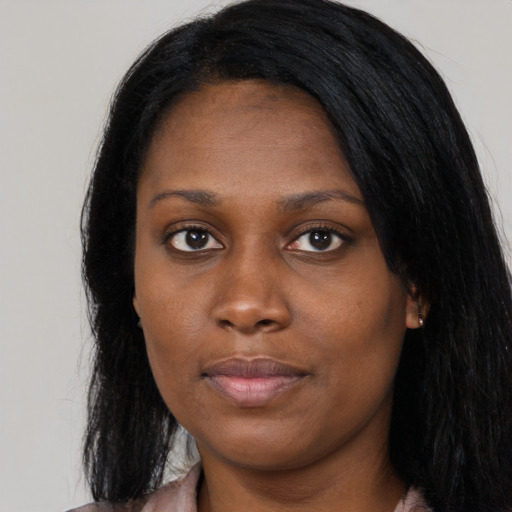 Neutral black young-adult female with long  black hair and brown eyes