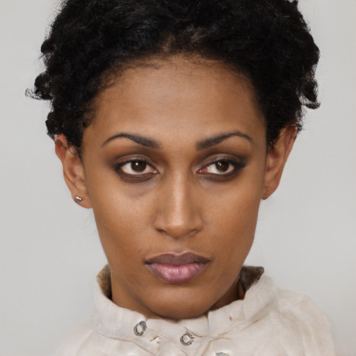 Neutral latino young-adult female with short  black hair and brown eyes