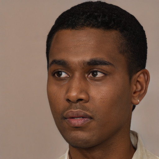 Neutral black young-adult male with short  black hair and brown eyes