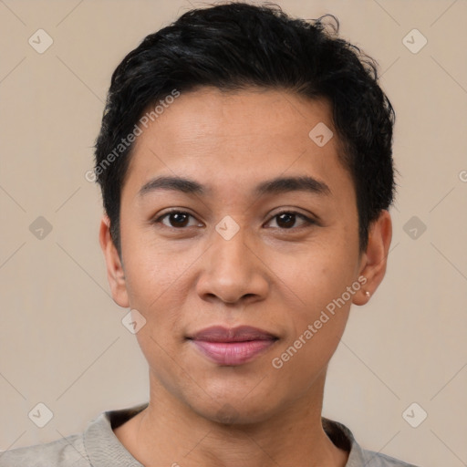 Joyful latino young-adult male with short  black hair and brown eyes