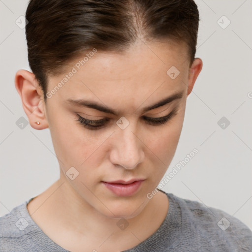 Joyful white young-adult female with short  brown hair and brown eyes