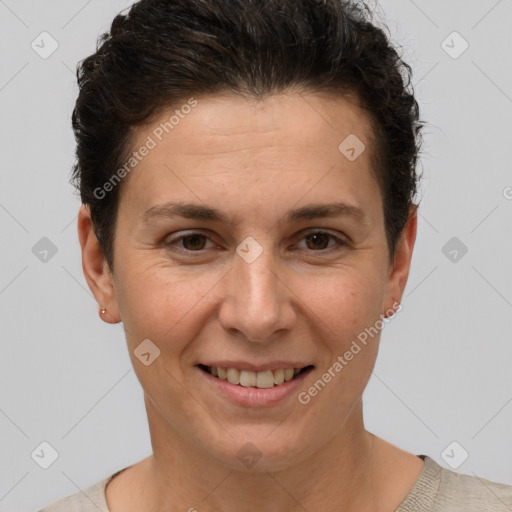 Joyful white adult female with short  brown hair and brown eyes