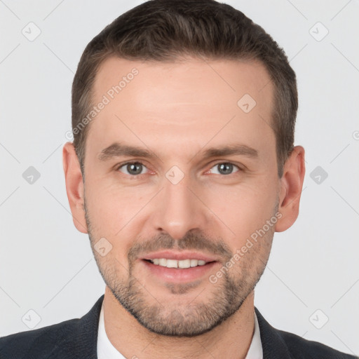 Joyful white young-adult male with short  brown hair and brown eyes