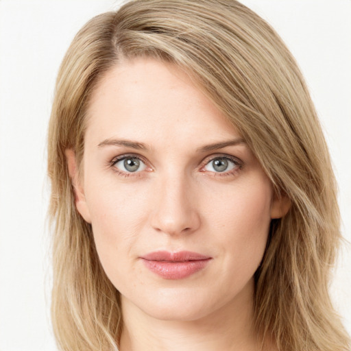 Joyful white young-adult female with long  brown hair and blue eyes