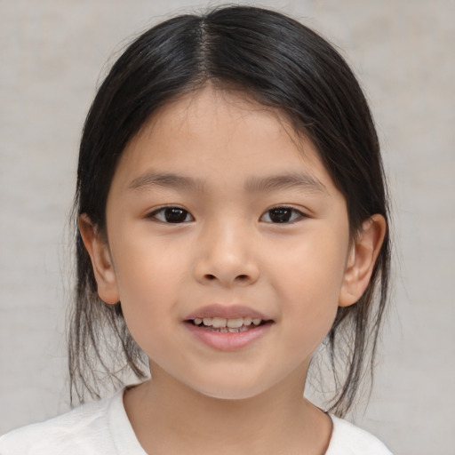 Joyful asian child female with medium  brown hair and brown eyes