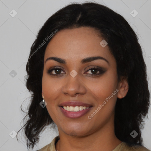 Joyful latino young-adult female with long  black hair and brown eyes