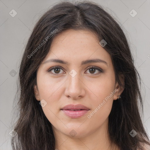 Joyful white young-adult female with long  brown hair and brown eyes