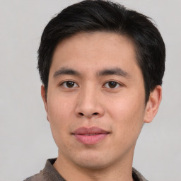 Neutral asian young-adult male with short  black hair and brown eyes