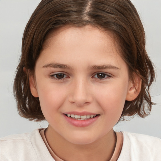 Joyful white child female with medium  brown hair and brown eyes