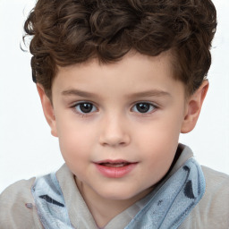 Joyful white child male with short  brown hair and brown eyes