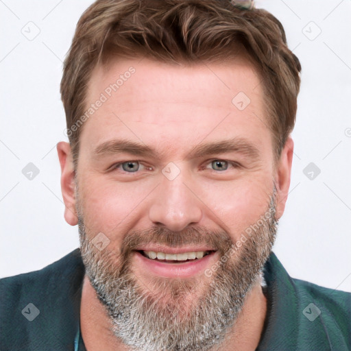 Joyful white adult male with short  brown hair and grey eyes