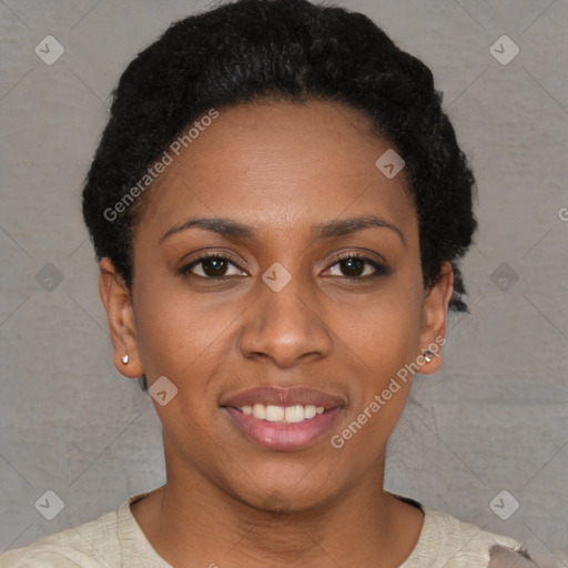 Joyful black young-adult female with short  brown hair and brown eyes