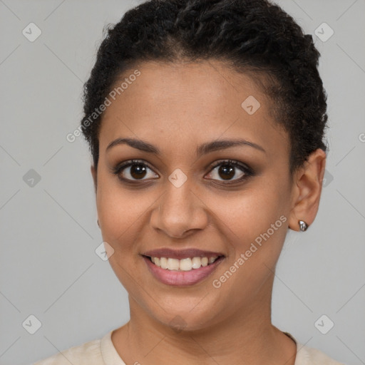 Joyful latino young-adult female with short  brown hair and brown eyes